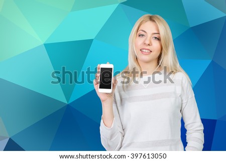 Happy pretty woman showing a blank smart phone screen 