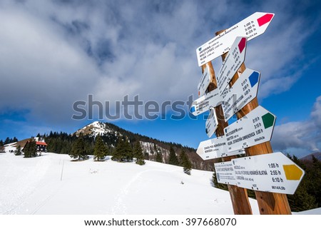 Hiking signpost in Velka Fatra mountains, winter  trip, Slovakia 