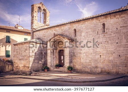 Beautiful church in San Quirico Dorcia tuscan town Royalty-Free Stock Photo #397677127