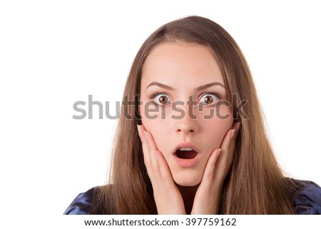 Headshot of a lady looking surprised with hands on her face.