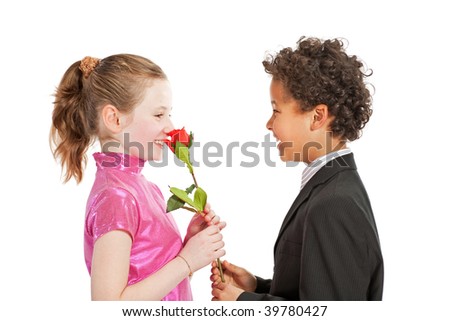 boy giving a rose to a girl, isolated on a white background
