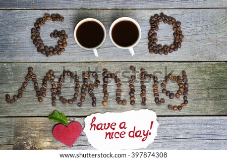 good morning and have a nice day concept - coffee beans, Cup of black coffee, heart from coffee beans, coffee leaves. Toned, selective focus image. lovely message