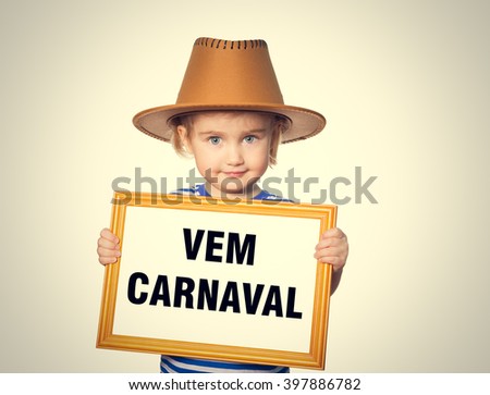 Little Funny girl in striped shirt with blackboard. Text  vem carnaval.  Isolated on gray background.