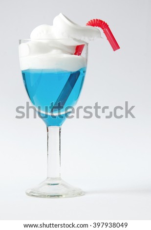 blue alcoholic drink in a glass