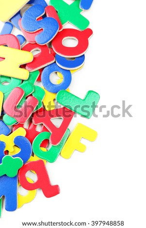 Magnetic plastic letters on white background