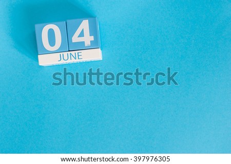 June 4th. Image of june 4 wooden color calendar on blue background.  Summer day, empty space for text