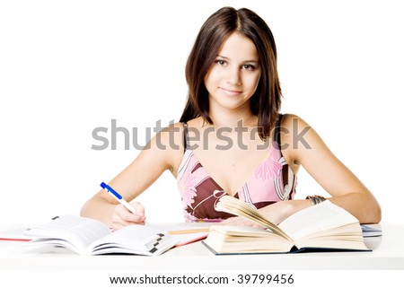 Photo of a happy female student, doing homework