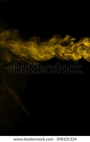 Gold smoke on black background, 