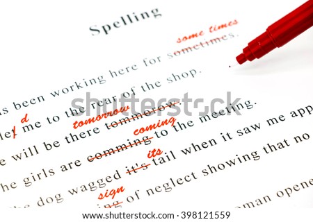 red pen marked on wrong spelling and write correct word above Royalty-Free Stock Photo #398121559