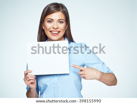 Business woman finger pointing on white sign board. Smiling young woman.