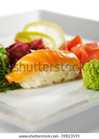 Japanese Cuisine -  Salmon Nigiri Sushi with Ginger and Seaweed