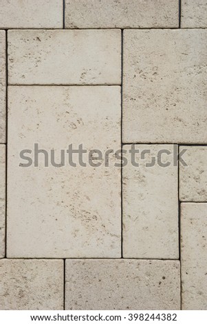 Brown sandstone tile wall texture and background