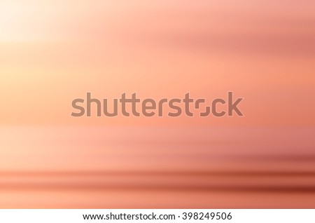 Motion blur tropical sunset beach abstract background. Travel concept.