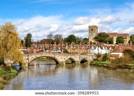 Rural Kent. View of Aylesford village in Kent, England with medieval bridge and church. Royalty-Free Stock Photo #398289955
