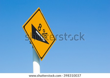 slope traffic sign with blue sky