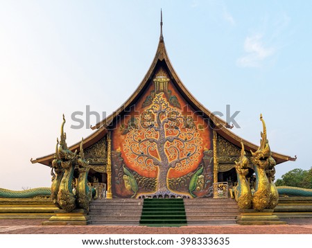 Temple Sirindhorn Wararam Phuproud in Ubon Ratchathani Province with sunset sky, Thailand.The public temple of buddhism