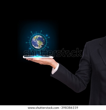 Businessman hands holding tablet with Earth planet. Elements of this image are furnished by NASA