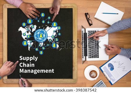 Businessman working at office desk and using computer and objects on the right, coffee,  top view, with copy space