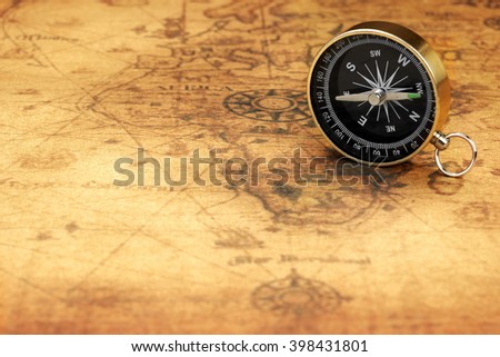 Close Up Of Magnetic Compass On The Old Map, Front View, Horizontal Image