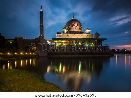 Reflection of Putra Mosque at dusk in Putrajaya, Malaysia.