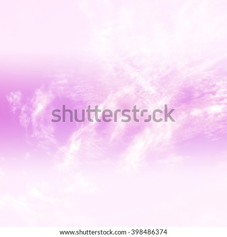 Soft blurred of cloud background with a pastel colored orange to blue gradient.