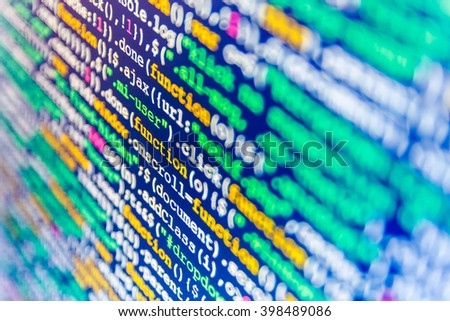 Website codes on computer monitor. Monitor photo.  Abstract screen of software. Software source code. Computer script.  Developer working on software codes in office. Programmer occupation. 
