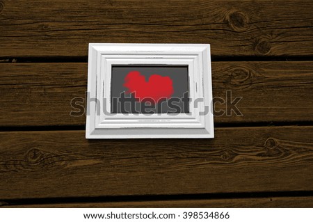 Brown wooden floor with picture frame and cloud