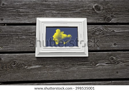 Picture frame with yellow cloud
