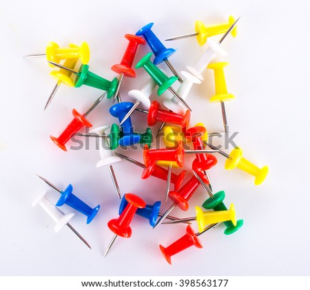 Set of paper clips of various colors on a light background