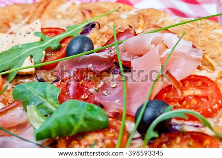 Italian prosciutto and rucola pizza.