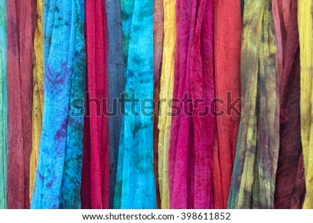 Multicolored fabric with a mottled pattern, texture
