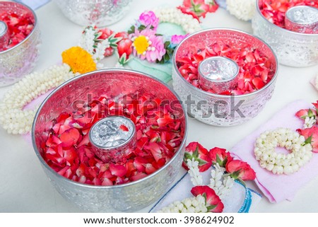 Thai garland flowers and roses corolla in silver bowl (Use for Songkran festival in Thailand)
