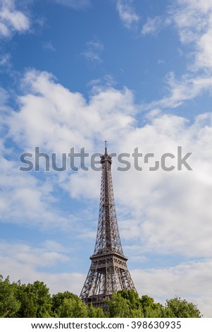 Paris, the beautiful view of the Eiffel Tower on a summer day
