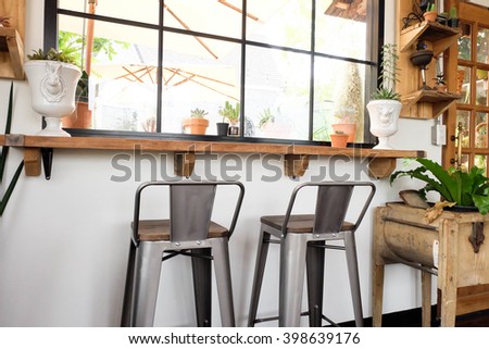 Vintage tables and chairs in coffee shop or restaurant.