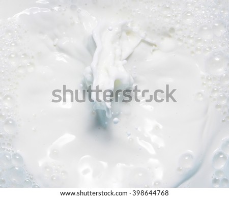 High resolution beautiful splash of natural milk. Can be used as background
