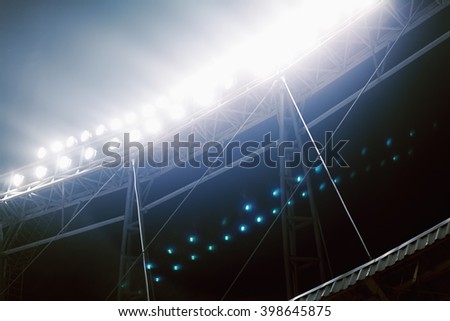 View of stadium lights at night Royalty-Free Stock Photo #398645875