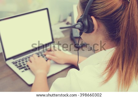 close up blur call center woman talking and working with partner concept Royalty-Free Stock Photo #398660302
