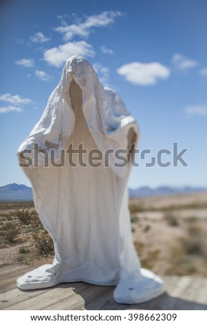 Ghost figure, Symbolic White Plaster Ghost Emblem of the Abandoned Miner's Ghost City Rhyolite in Nevada, USA