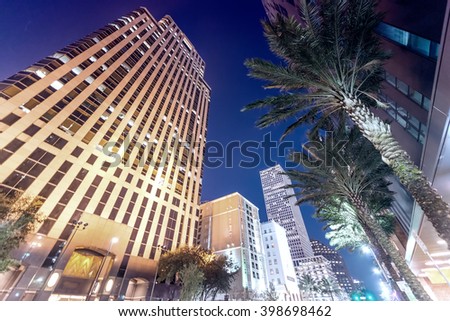 Streets and buildings of New Orleans at night, Louisiana.