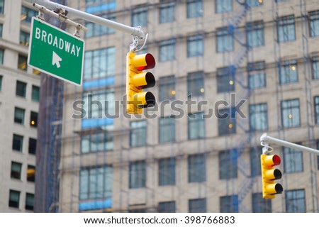 New York city traffic lights with skyscrapers on background 
