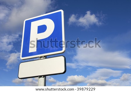 parking signal with cloudy sky