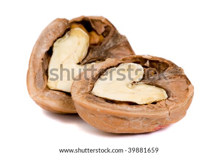 Two half walnuts with heart-shaped nuts. They are really in love...