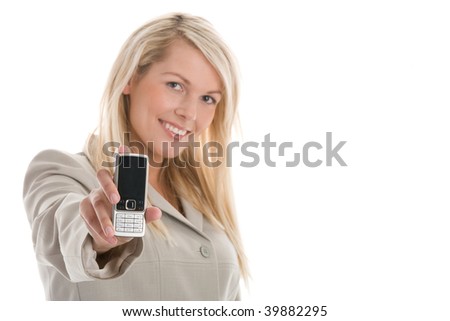 Portrait of young attractive blond businesswoman displaying mobile phone isolated on white background. Focus on phone.