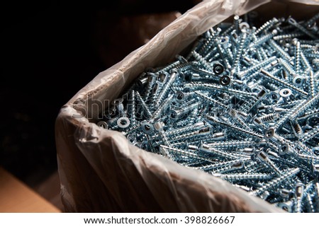 box with large number of furniture screws