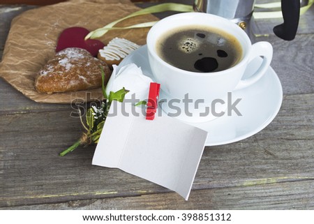 Heart shaped cookies , cup of coffee, white rose decoration, coffee maker. Romantic Breakfast. Toned, selected focus image