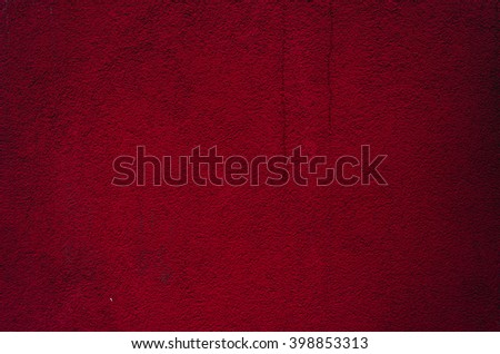 Fragment of rough red wall
