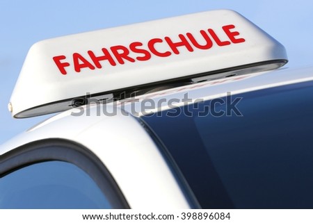 German driving school car roof sign