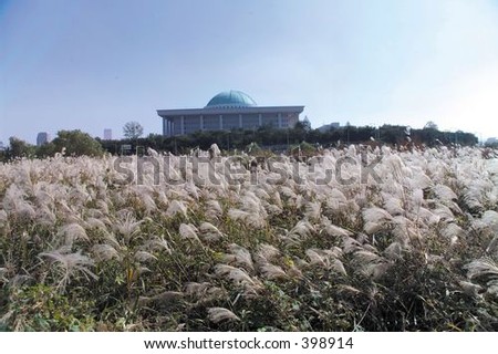 the National Assembly Building with beautiful Nature View - on a background of bright and sunny blue sky