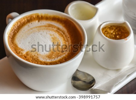 A cup of cappuccino Royalty-Free Stock Photo #398991757