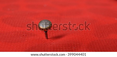 Picture of a Clock wheel on a red background, 